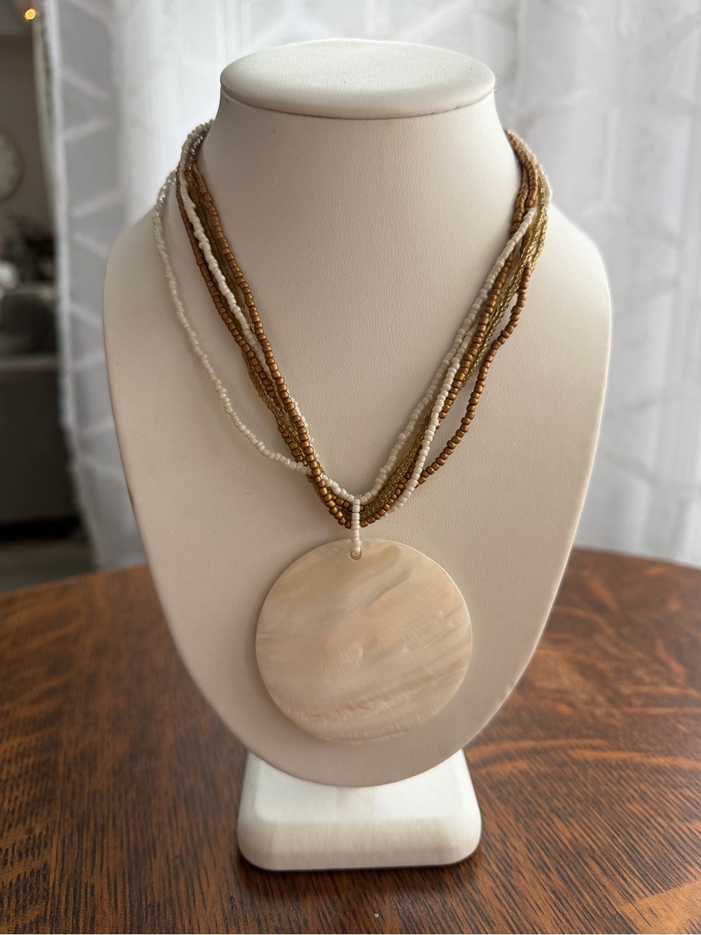 Beaded Multi-Strand Shell Pendant Necklace in Cream and Brown